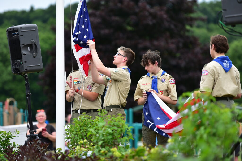 Scouts Raising Flag